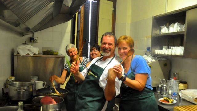 Having fun learning authentic Tuscan recipes from Chef Lorenzo in our private cooking class in Radda in Chianti